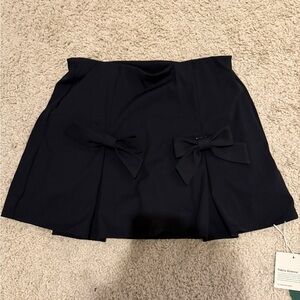 HALARA Black Tennis Skirt with Bow Accents